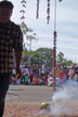 man lits firecrackers