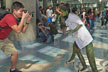 photographer aims cosplayer