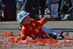 kid slides on ground