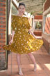 girl in gold dress
