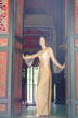 girl stands at door