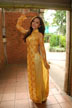 Tram in yellow ao dai