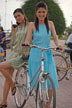 two girls with bicycle